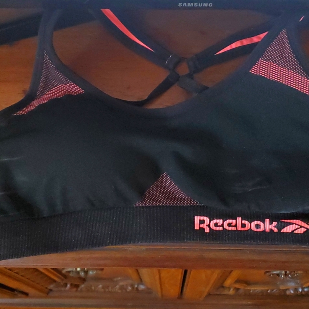 Small pink/black reebok sports bra